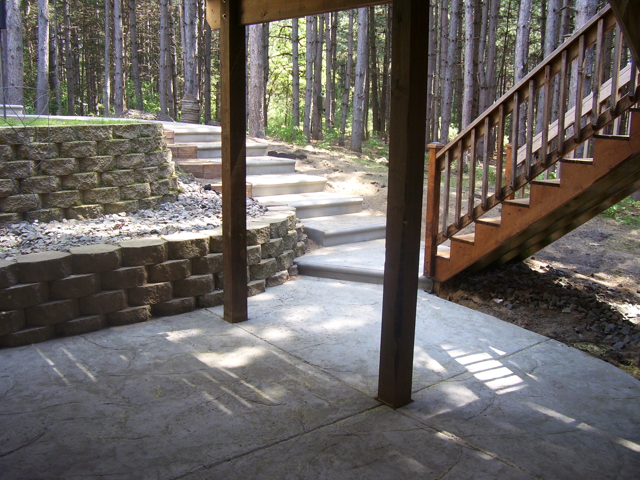 Under Deck Granite Stamped Patio And Bullnose Steps